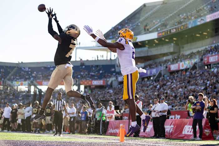 Purdue Boilermakers cornerback Jamari Brown (7) intercepts a pass to LSU Tigers wide receiver Kyren Lacy (2) during the second half at Camping World Stadium.